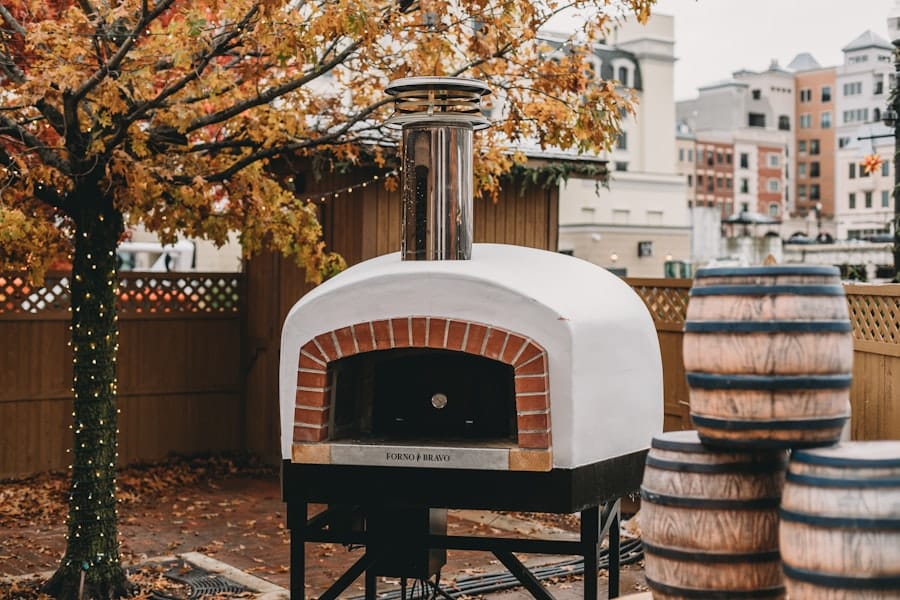 Photo Outdoor kitchen with pizza oven
