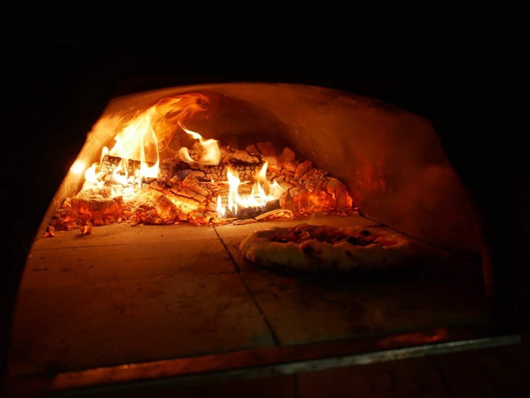 Photo Outdoor kitchen with pizza oven